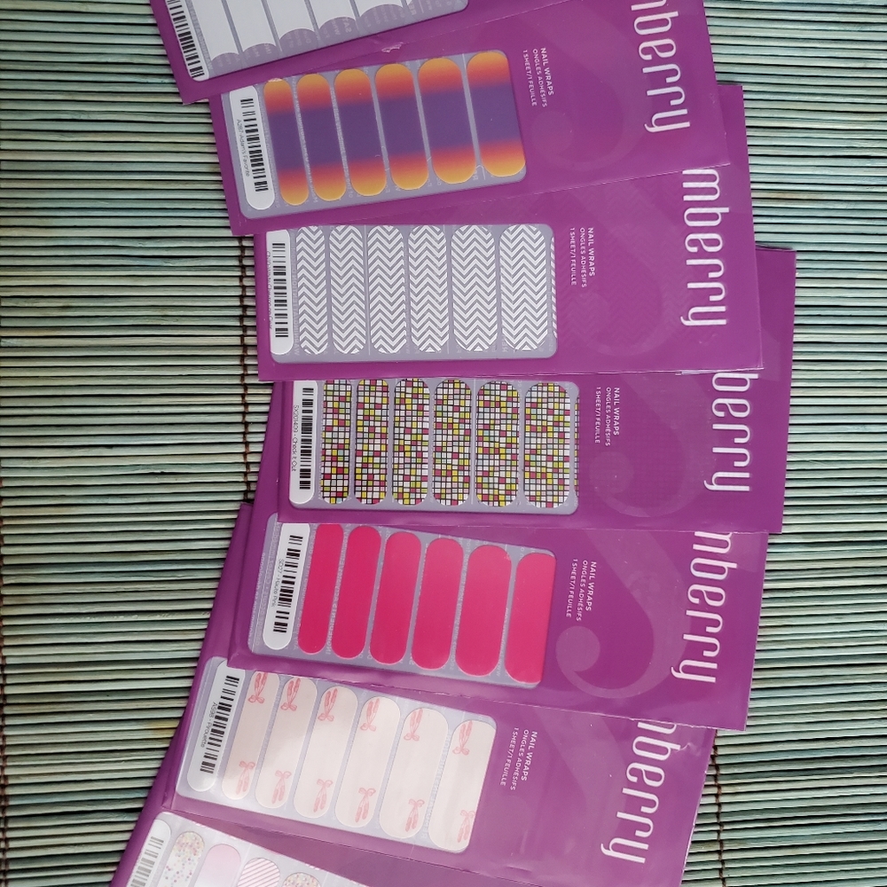 Lot of Jamberry nail wraps, mini heater, and bag
